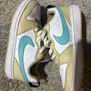 Nike Sneakers with Cream and White Design